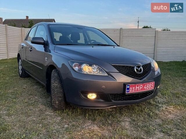 Сірий Мазда 3, об'ємом двигуна 1.6 л та пробігом 239 тис. км за 5699 $, фото 2 на Automoto.ua