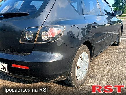 Серый Мазда 3, объемом двигателя 1.3 л и пробегом 180 тыс. км за 3200 $, фото 4 на Automoto.ua
