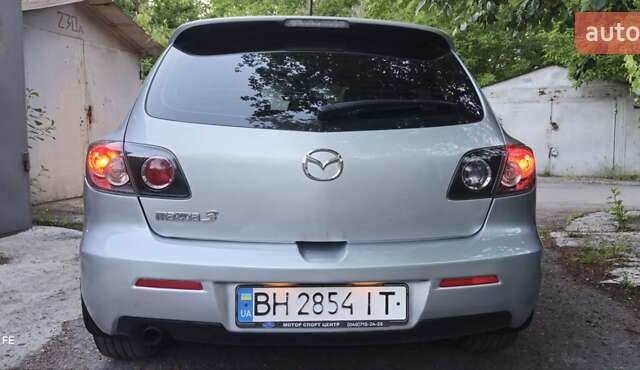 Серый Мазда 3, объемом двигателя 1.6 л и пробегом 297 тыс. км за 5600 $, фото 4 на Automoto.ua