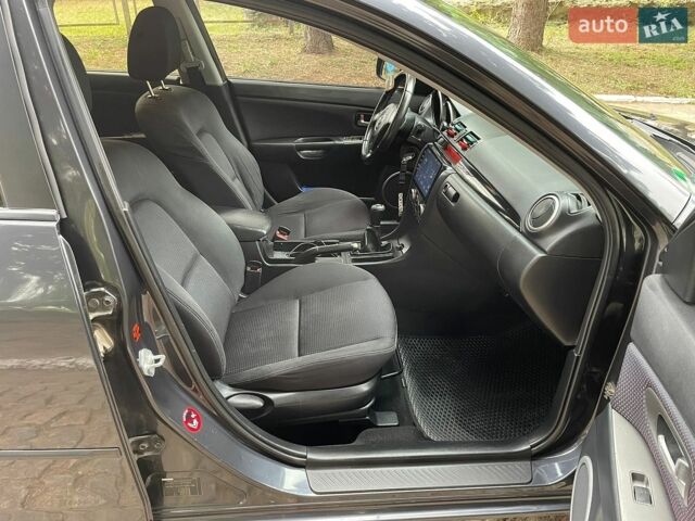 Сірий Мазда 3, об'ємом двигуна 1.6 л та пробігом 285 тис. км за 4100 $, фото 17 на Automoto.ua