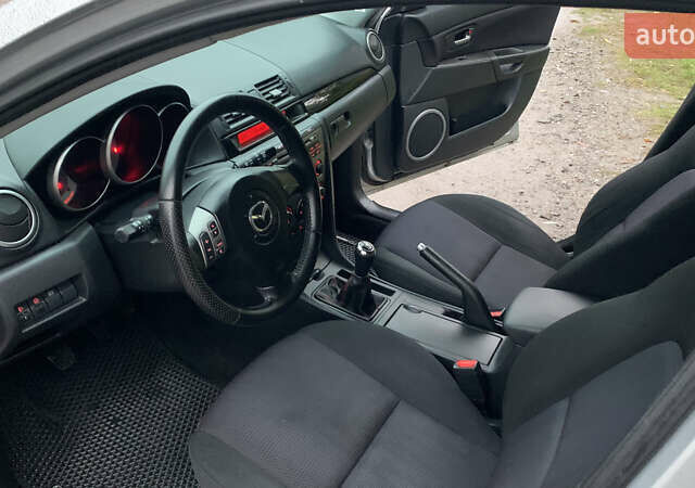 Серый Мазда 3, объемом двигателя 1.6 л и пробегом 157 тыс. км за 4950 $, фото 11 на Automoto.ua