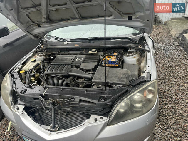 Серый Мазда 3, объемом двигателя 1.6 л и пробегом 200 тыс. км за 1750 $, фото 5 на Automoto.ua