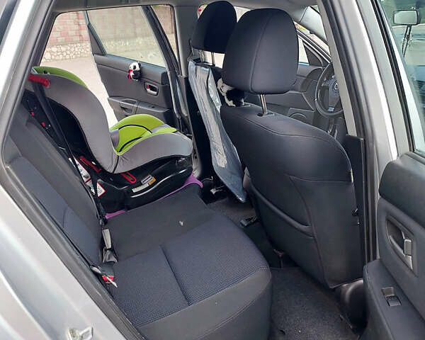 Серый Мазда 3, объемом двигателя 1.6 л и пробегом 211 тыс. км за 4750 $, фото 10 на Automoto.ua