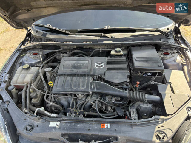 Сірий Мазда 3, об'ємом двигуна 1.6 л та пробігом 233 тис. км за 6000 $, фото 16 на Automoto.ua