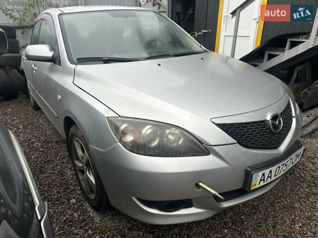 Серый Мазда 3, объемом двигателя 1.6 л и пробегом 200 тыс. км за 1750 $, фото 1 на Automoto.ua