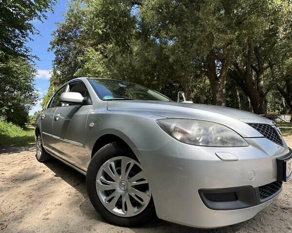 Серый Мазда 3, объемом двигателя 1.6 л и пробегом 173 тыс. км за 4400 $, фото 3 на Automoto.ua