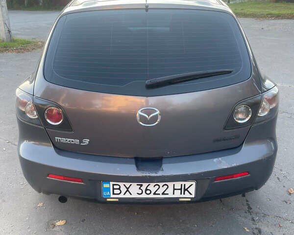 Серый Мазда 3, объемом двигателя 2 л и пробегом 300 тыс. км за 6500 $, фото 4 на Automoto.ua