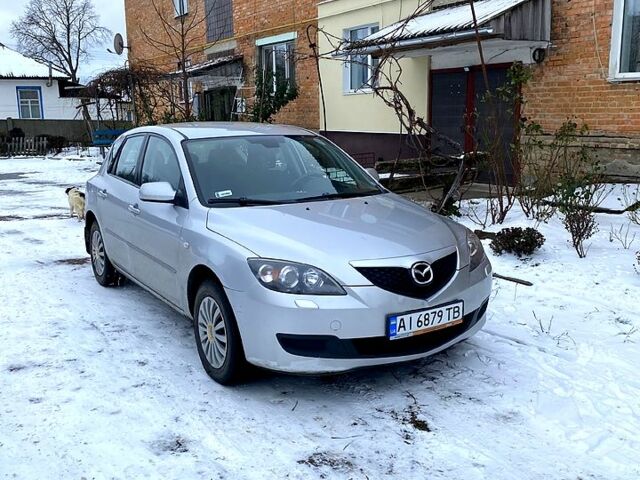 Серый Мазда 3, объемом двигателя 1.6 л и пробегом 320 тыс. км за 3500 $, фото 1 на Automoto.ua