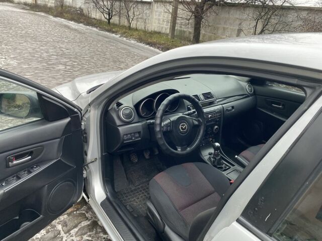 Серый Мазда 3, объемом двигателя 1.6 л и пробегом 227 тыс. км за 2900 $, фото 6 на Automoto.ua