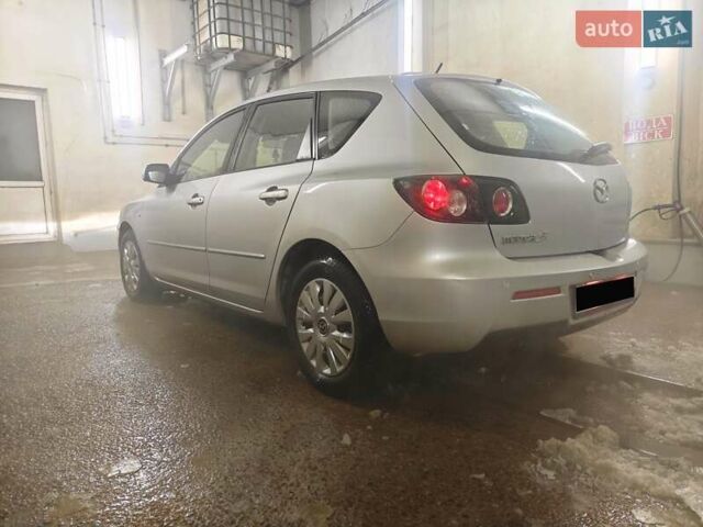 Серый Мазда 3, объемом двигателя 1.6 л и пробегом 118 тыс. км за 5699 $, фото 7 на Automoto.ua