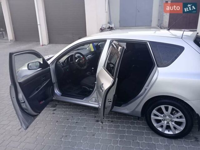 Серый Мазда 3, объемом двигателя 1.6 л и пробегом 229 тыс. км за 5200 $, фото 1 на Automoto.ua