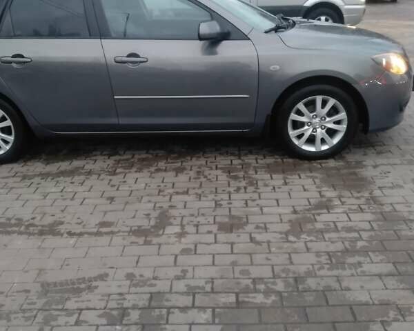 Серый Мазда 3, объемом двигателя 1.6 л и пробегом 128 тыс. км за 4850 $, фото 3 на Automoto.ua