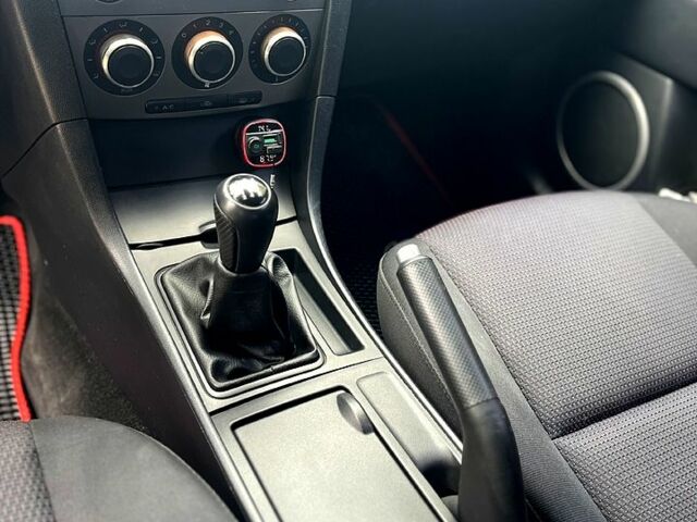 Серый Мазда 3, объемом двигателя 1.6 л и пробегом 220 тыс. км за 5499 $, фото 6 на Automoto.ua