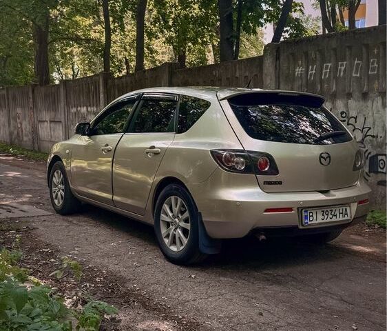 Сірий Мазда 3, об'ємом двигуна 1.6 л та пробігом 158 тис. км за 4600 $, фото 4 на Automoto.ua