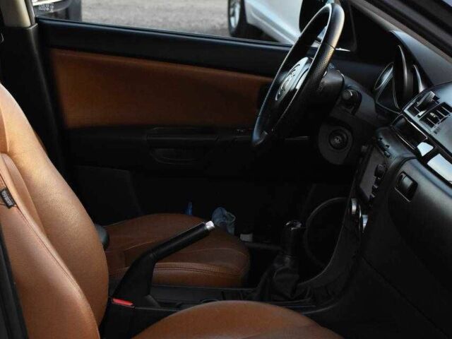 Серый Мазда 3, объемом двигателя 1.6 л и пробегом 246 тыс. км за 4550 $, фото 11 на Automoto.ua