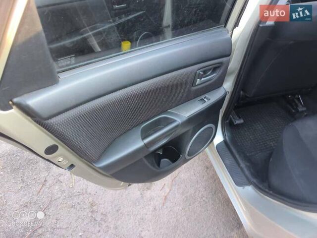 Серый Мазда 3, объемом двигателя 1.6 л и пробегом 185 тыс. км за 5999 $, фото 9 на Automoto.ua