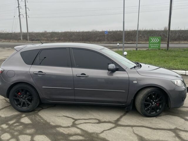 Серый Мазда 3, объемом двигателя 1.6 л и пробегом 290 тыс. км за 4999 $, фото 6 на Automoto.ua