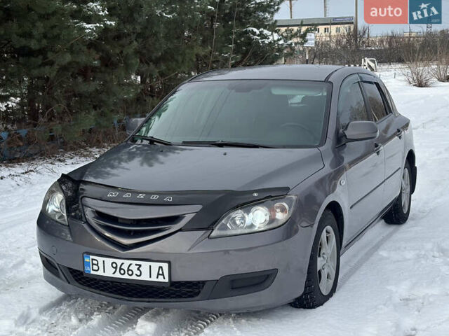 Серый Мазда 3, объемом двигателя 1.6 л и пробегом 200 тыс. км за 5999 $, фото 20 на Automoto.ua