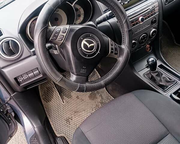 Серый Мазда 3, объемом двигателя 1.56 л и пробегом 269 тыс. км за 5200 $, фото 18 на Automoto.ua