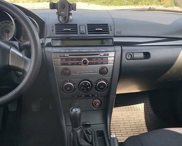 Серый Мазда 3, объемом двигателя 1.6 л и пробегом 230 тыс. км за 4900 $, фото 15 на Automoto.ua