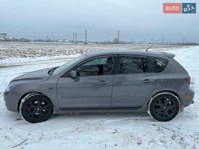 Серый Мазда 3, объемом двигателя 1.6 л и пробегом 320 тыс. км за 7999 $, фото 4 на Automoto.ua