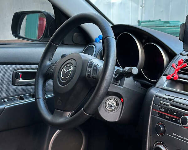Серый Мазда 3, объемом двигателя 1.6 л и пробегом 248 тыс. км за 4600 $, фото 32 на Automoto.ua