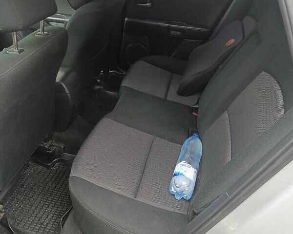 Серый Мазда 3, объемом двигателя 1.6 л и пробегом 195 тыс. км за 5000 $, фото 9 на Automoto.ua