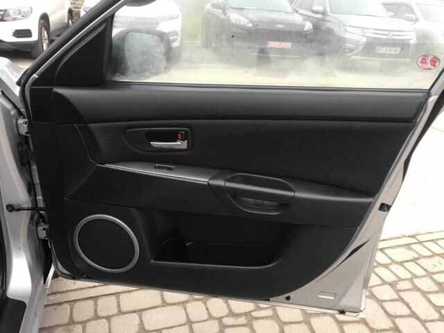 Серый Мазда 3, объемом двигателя 1.6 л и пробегом 220 тыс. км за 5090 $, фото 12 на Automoto.ua