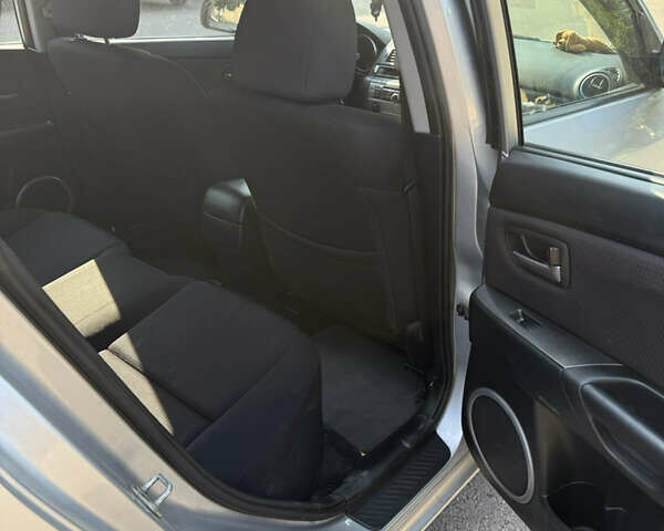 Сірий Мазда 3, об'ємом двигуна 1.56 л та пробігом 223 тис. км за 4999 $, фото 9 на Automoto.ua