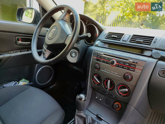 Сірий Мазда 3, об'ємом двигуна 1.6 л та пробігом 275 тис. км за 4950 $, фото 5 на Automoto.ua