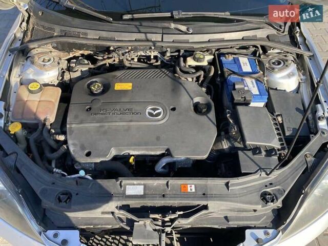 Серый Мазда 3, объемом двигателя 2 л и пробегом 301 тыс. км за 5400 $, фото 17 на Automoto.ua