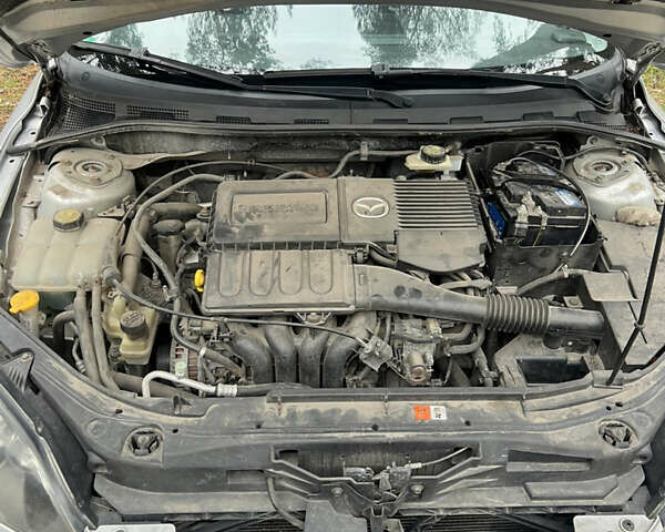 Серый Мазда 3, объемом двигателя 1.6 л и пробегом 217 тыс. км за 4300 $, фото 16 на Automoto.ua