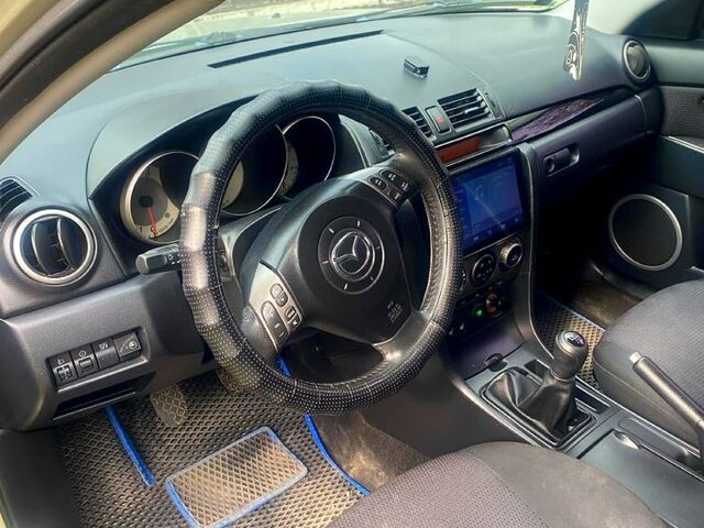 Серый Мазда 3, объемом двигателя 2 л и пробегом 240 тыс. км за 3850 $, фото 2 на Automoto.ua