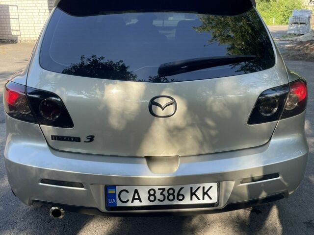 Серый Мазда 3, объемом двигателя 1.6 л и пробегом 255 тыс. км за 4800 $, фото 2 на Automoto.ua
