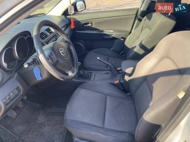 Серый Мазда 3, объемом двигателя 2 л и пробегом 301 тыс. км за 5400 $, фото 8 на Automoto.ua