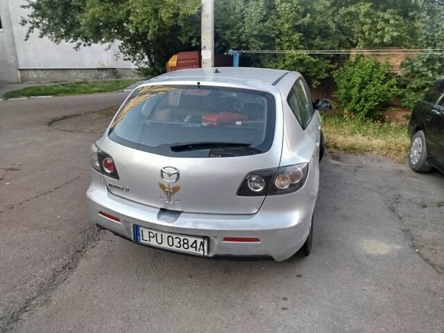 Серый Мазда 3, объемом двигателя 1.6 л и пробегом 350 тыс. км за 1400 $, фото 3 на Automoto.ua
