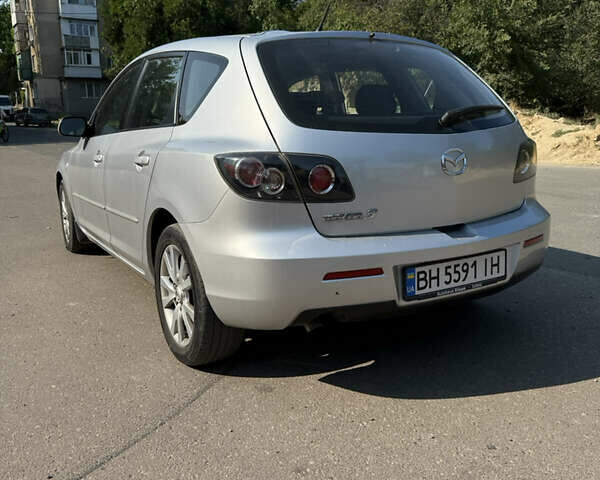 Сірий Мазда 3, об'ємом двигуна 1.56 л та пробігом 223 тис. км за 4999 $, фото 6 на Automoto.ua