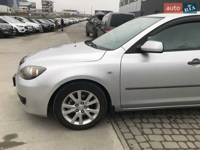 Серый Мазда 3, объемом двигателя 1.6 л и пробегом 220 тыс. км за 5090 $, фото 2 на Automoto.ua