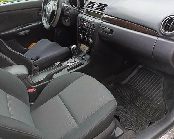 Серый Мазда 3, объемом двигателя 1.6 л и пробегом 195 тыс. км за 5000 $, фото 2 на Automoto.ua