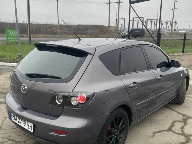 Серый Мазда 3, объемом двигателя 1.6 л и пробегом 290 тыс. км за 4999 $, фото 3 на Automoto.ua