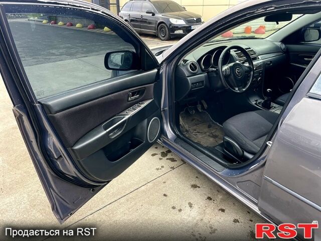 Сірий Мазда 3, об'ємом двигуна 2 л та пробігом 250 тис. км за 5900 $, фото 6 на Automoto.ua