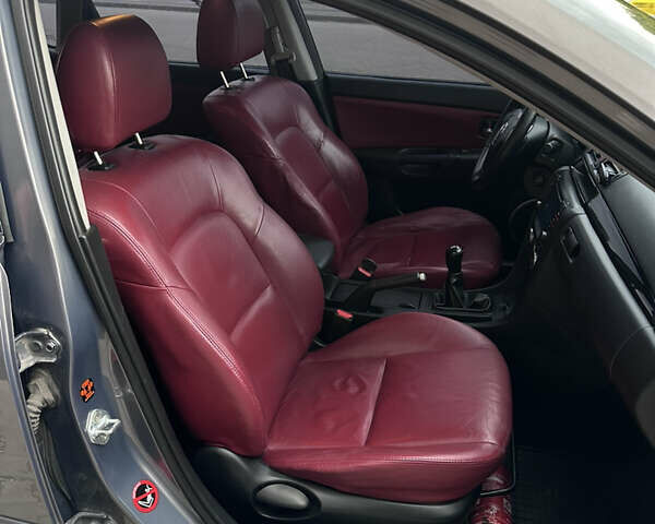 Серый Мазда 3, объемом двигателя 1.6 л и пробегом 268 тыс. км за 5400 $, фото 9 на Automoto.ua