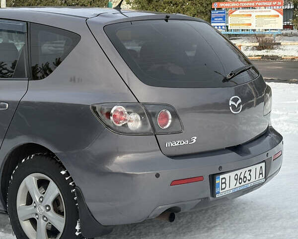 Серый Мазда 3, объемом двигателя 1.6 л и пробегом 200 тыс. км за 5999 $, фото 27 на Automoto.ua