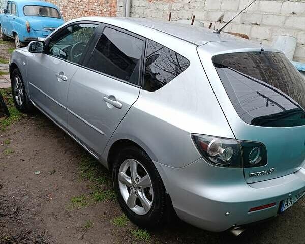 Серый Мазда 3, объемом двигателя 1.6 л и пробегом 195 тыс. км за 5000 $, фото 1 на Automoto.ua
