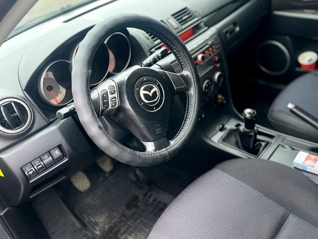 Серый Мазда 3, объемом двигателя 1.6 л и пробегом 29000 тыс. км за 4800 $, фото 8 на Automoto.ua