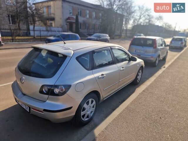 Серый Мазда 3, объемом двигателя 1.56 л и пробегом 320 тыс. км за 5800 $, фото 3 на Automoto.ua