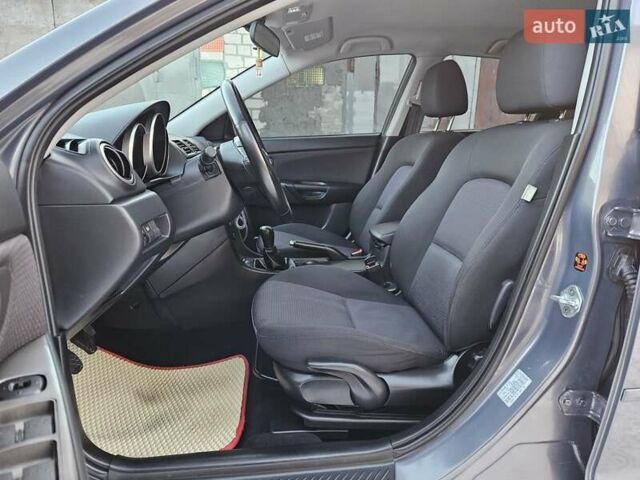 Сірий Мазда 3, об'ємом двигуна 1.6 л та пробігом 289 тис. км за 5300 $, фото 68 на Automoto.ua