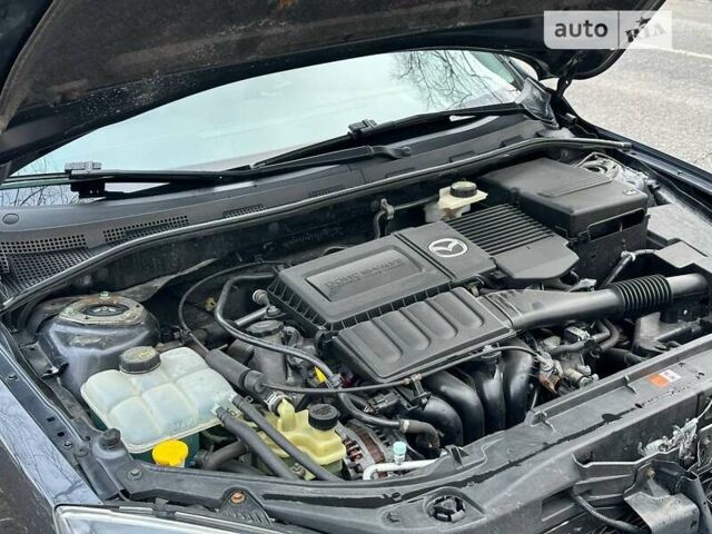 Серый Мазда 3, объемом двигателя 1.6 л и пробегом 210 тыс. км за 6100 $, фото 25 на Automoto.ua