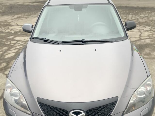 Серый Мазда 3, объемом двигателя 1.6 л и пробегом 290 тыс. км за 4999 $, фото 2 на Automoto.ua