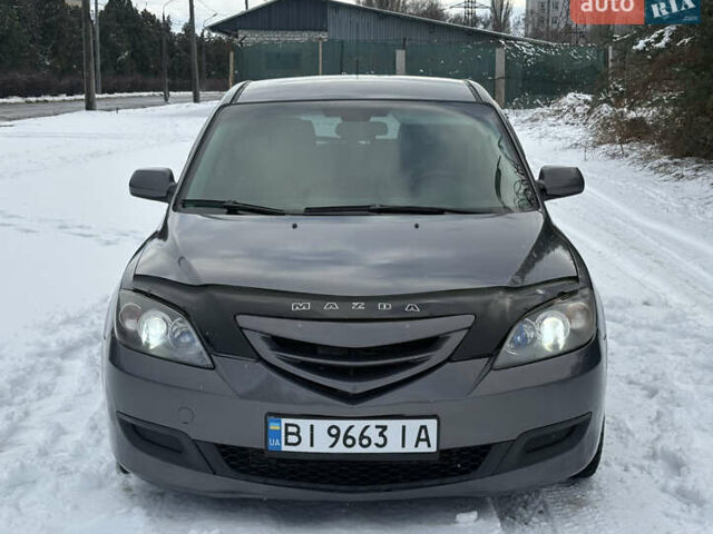 Серый Мазда 3, объемом двигателя 1.6 л и пробегом 200 тыс. км за 5999 $, фото 4 на Automoto.ua